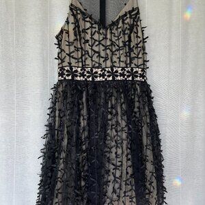 Ryu black lace mini party dress, sheer with bows Woman's sz M